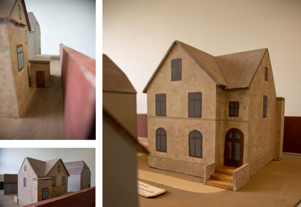 verschiedene Ansichten eines Modells eine zweistöckigen Gebäudes.